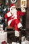 Santa claus talking to smart phone