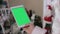 Santa Claus Using Digital Tablet Green Screen