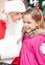 Santa Claus Whispering In Girl\'s Ear
