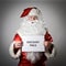 Santa Claus and white paper. Discount price concept.