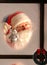 Santa Claus in Window with Silver Bell