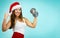 Santa claus woman lifting dumbbells