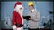 Santa Claus and Young Architect in a modern office, stock footage