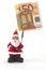 Santa clause figurine with fifty Euro