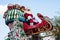 Santa Clause sits atop his sleigh in the Disneyland Parade