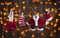 Santa clothing on a clothesline background of lights