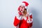 Santa Clous girl with eyeglasses and handset