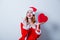 Santa Clous girl with heart shape gift