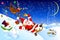 Santa descends from the mountain on a sled