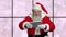 Santa with digital tablet showing ok sign.