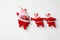 Santa dolls on a white background