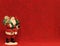 Santa figurine w/ red BG