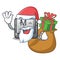 Santa with gift button M isolated in the cartoon