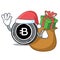 Santa with gift Bytecoin coin mascot cartoon