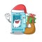 Santa with gift cartoon water vending machine on table