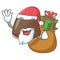 Santa with gift chocolate candies mascot cartoon