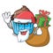 Santa with gift chocolate cupcake mascot cartoon