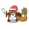Santa with gift concrete mixer mascot cartoon