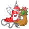 Santa with gift electric drill in the cartoon box