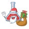 Santa with gift erlenmeyer flask in cartoon lab room