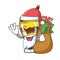 Santa with gift mangonada fruit mascot cartoon