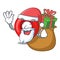 Santa with gift map marker navigation pin mascot cartoon