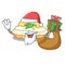 Santa with gift mascot delicious homemade lemon cake with sugar