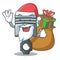 Santa with gift miniature piston in the cartoon shape