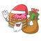 Santa with gift pancake with strawberry mascot cartoon