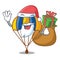 Santa with gift parachute in shape of acartoon fuuny