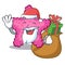 Santa with gift pink starfish animal on mascot sand