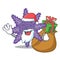 Santa with gift purple starfish the cartoon above sand