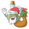 Santa with gift small bottle of olive oil mascot