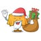Santa with gift table cloth mascot cartoon