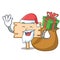 Santa with gift wooden board mascot cartoon