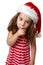 Santa girl hushing or gesturing for quiet
