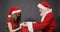 Santa Gives Bags with Presents to Girl