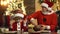 Santa grandfather with little kid boy prepare Christmas and New Year, baking christmas cookies at the decorated kitchen
