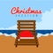 Santa hat on a beach chair. Christmas vacation