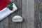 Santa Hat with the text Believe on a Stone Rock