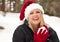 Santa Hat Wearing Pretty Woman Having Fun in Snow