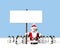 Santa holding a sign surrounded by penguins