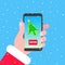 Santa holds phone with christmas tree cursor pointer arrow on the screen.