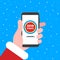 Santa holds phone with timer on the loading page on screen.