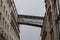 Santa Justa Elevator seen from below in between facades in Lisbon, Portugal