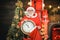 Santa make funny face and holding clock showing five minutes to midnight. Happy Christmas Santa. Its almost twelve clock