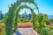 Santa Maria of Alhambra church through the rose arch, Generalife garden, Alhambra, Granada, Spain