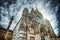 Santa Maria Assunta cathedral in Siena under a dramatic sky