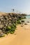 SANTA MARIA, CABO VERDE - DECEMBER 02, 2017: breakwater stones by pier on the beach in Santa Maria