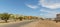 SANTA MARIA, CABO VERDE - NOVEMBER 29, 2017: street with palms and colored apartments across hotels in Santa Maria